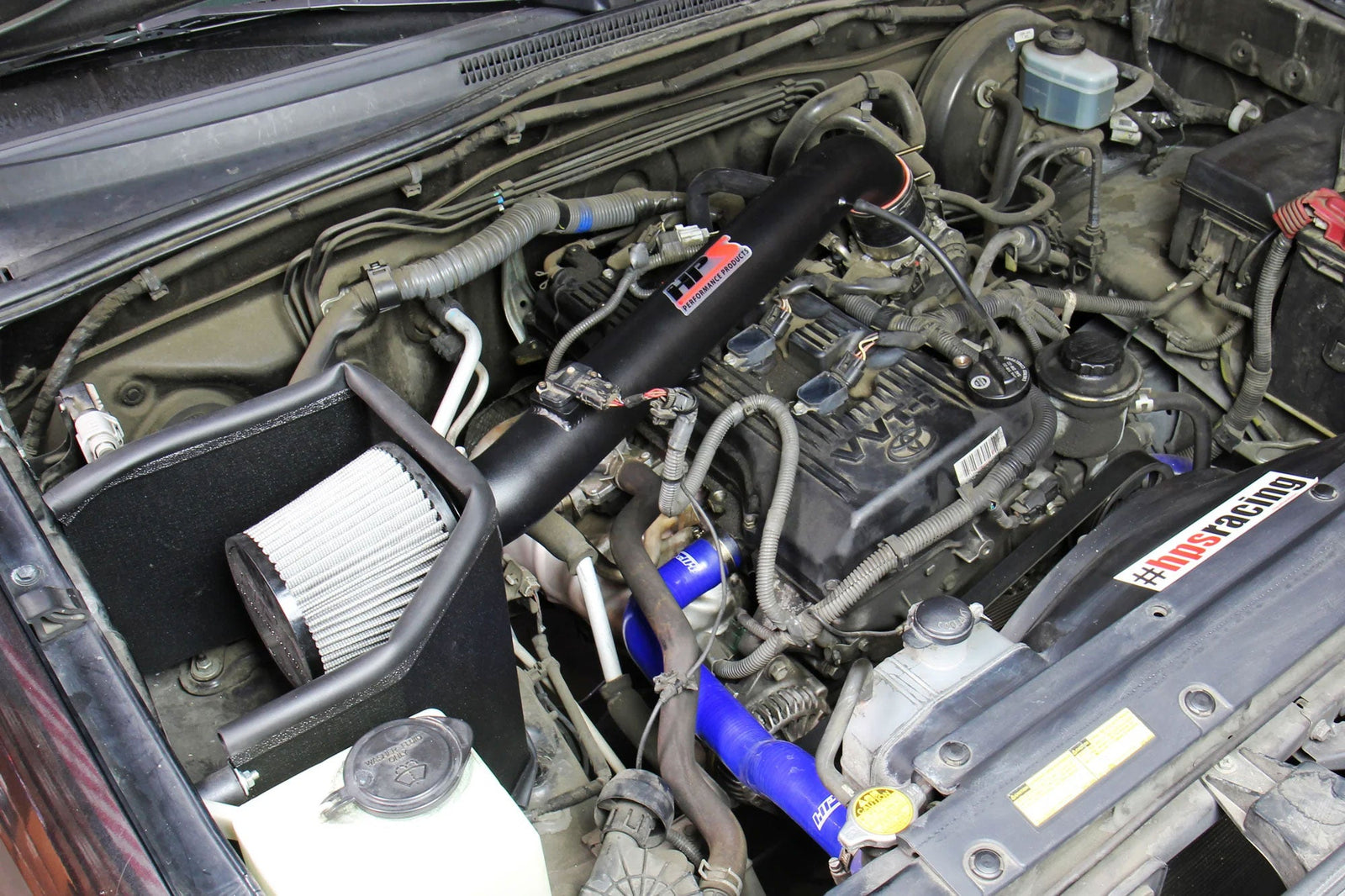 HPS Shortram Air Intake Heat Shield Kit for 05-15 Toyota Tacoma 2.7L I4 Non-Turbo SKU 827-169WB, wrinkle black installed engine bay view