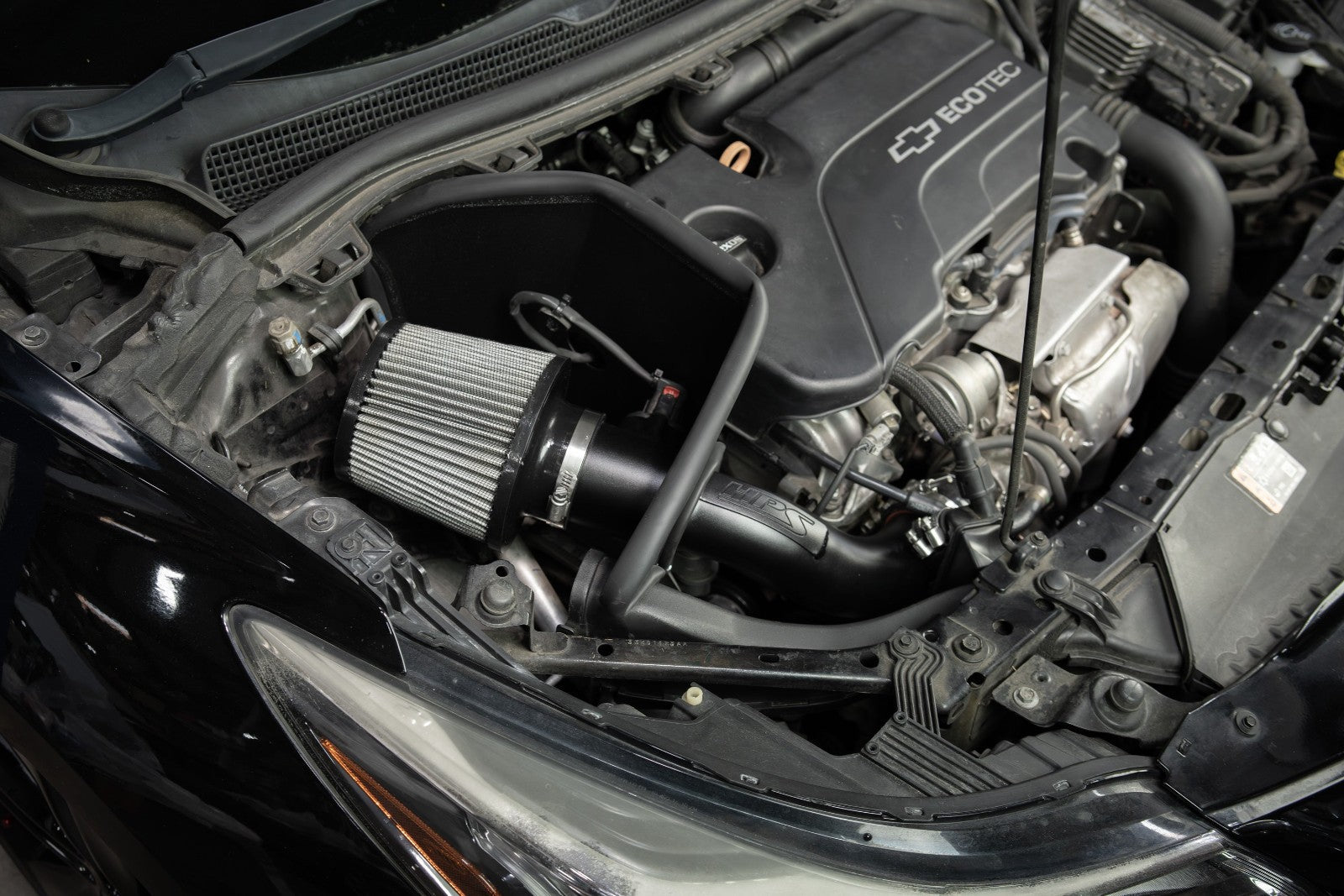 HPS Shortram Air Intake Heat Shield Kit for 16-19 Chevrolet Cruze 1.4L Turbo D2LC SKU 827-709WB, wrinkle black alternate installed engine bay view