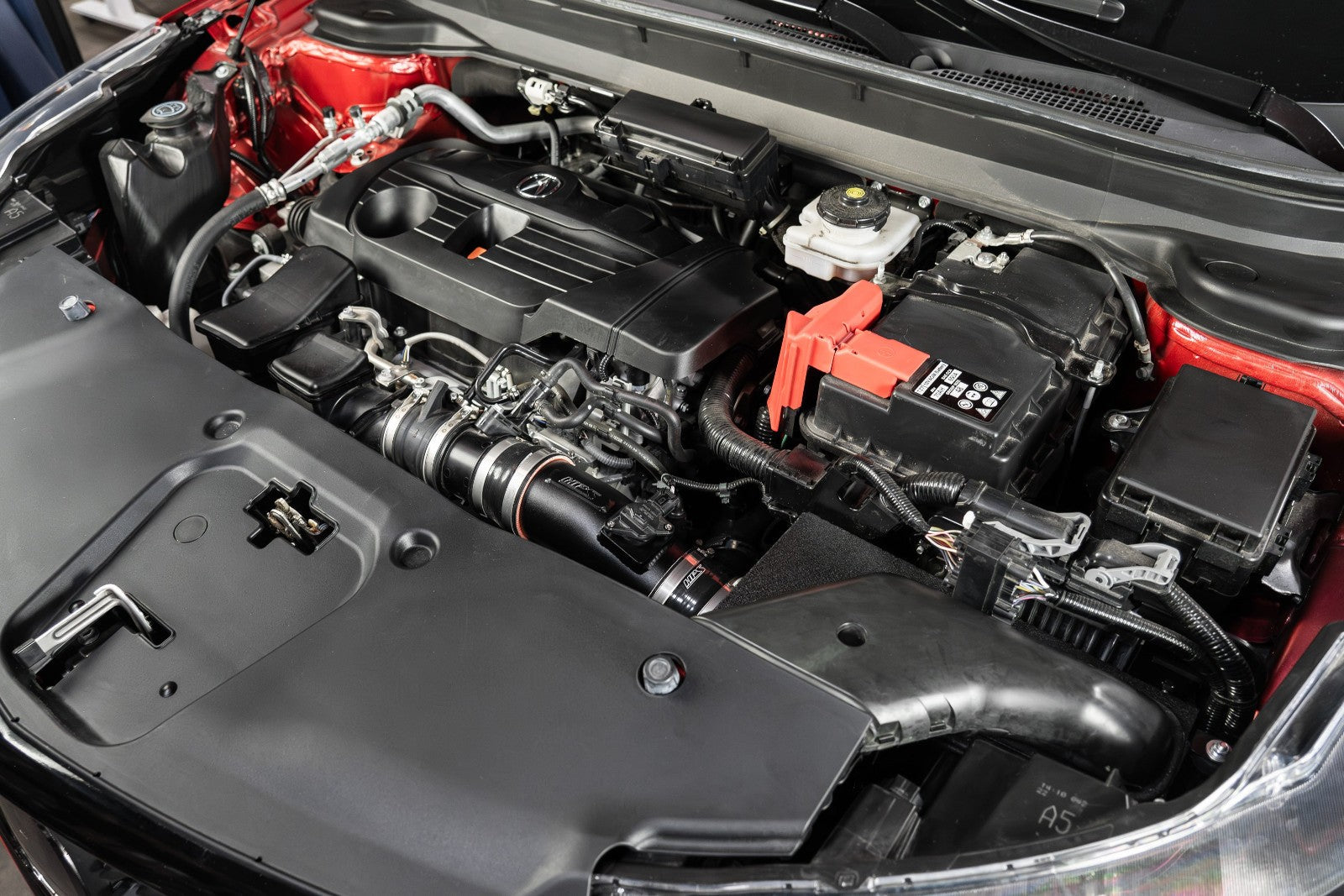 HPS Shortram Air Intake Heat Shield Kit for 19+ Acura RDX 2.0L Turbo TC1 / TC2 SKU 827-729WB, wrinkle black alternate installed engine bay view