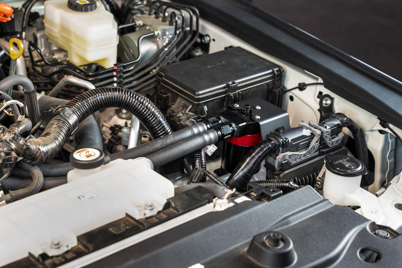 HPS-860-024 HPS Black/Red Oil Catch Can+Mount Bracket For 24+ Land Cruiser/Tacoma 2.4L Turbo