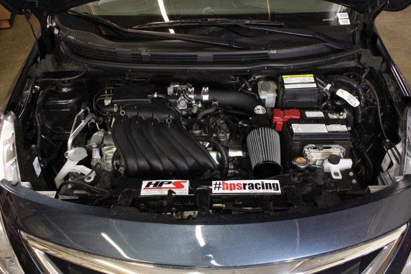 HPS Shortram Air Intake for 12-19 Nissan Versa Sedan (N17) / 14-19 Versa Note (E12) 1.6L SKU 827-532WB, wrinkle black installed engine bay view