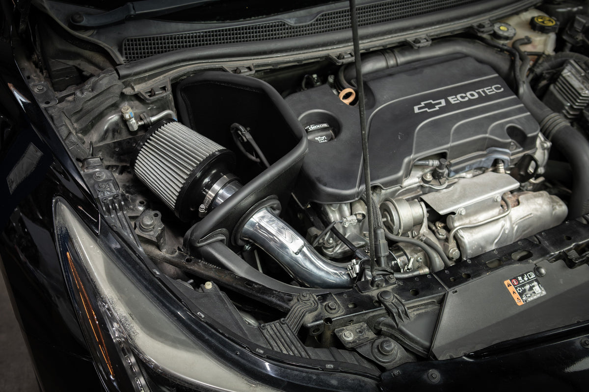 HPS Shortram Air Intake Heat Shield Kit for 16-19 Chevrolet Cruze 1.4L Turbo D2LC SKU 827-709P, polished alternate installed engine bay view
