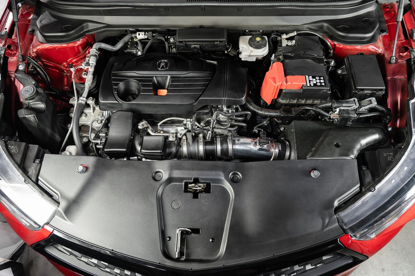 HPS Shortram Air Intake Heat Shield Kit for 19+ Acura RDX 2.0L Turbo TC1 / TC2 SKU 827-729P, polished installed engine bay view