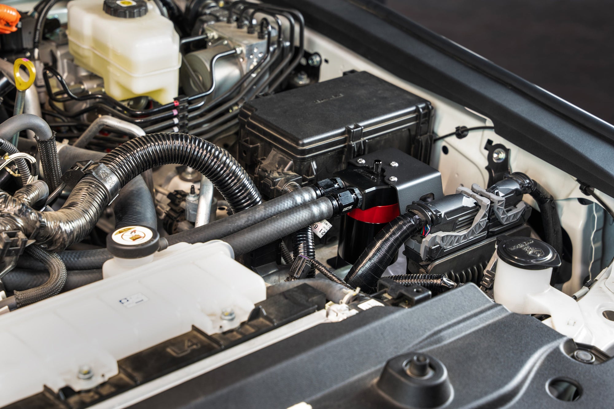 HPS-860-024 HPS Black/Red Oil Catch Can+Mount Bracket For 24+ Land Cruiser/Tacoma 2.4L Turbo